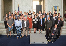 Dr. Carolyn Clancy stands with a distinguished group of VA scientists at the inaugural VA Research Day on the Hill in Washington D.C., held on June 19, 2018.