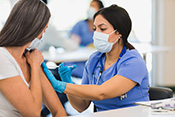 Mandatory vaccination of health care workers lowers flu risk