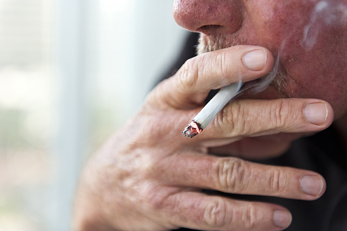  A VA study examining COVID-19 and tobacco use found older male Veterans, plus those with immunodeficiency, or endocrine or lung diseases, to be at higher risk of death. Smoking predicted mortality above and beyond those factors. (Photo for illustrative purposes only. Â©iStock_Juan Monino)
