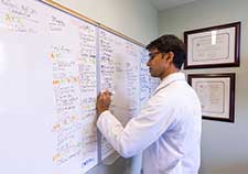 Dr. Ravi Parikh is a cancer doctor with expertise in informatics and health care delivery. Among other areas, he studies the use of health technologyâ€”such as artificial intelligenceâ€”to improve routine patient care. (Photo by Sam Shavers)