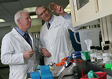Dr. Stuart Johnson (left), seen here with his mentor and colleague Dr. Dale Gerding, is an infectious disease clinician and researcher at the Edward Hines Jr. VA Hospital in Illinois.