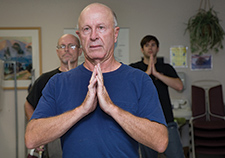 Veterans take part in a yoga class at the VA San Diego Healthcare System. 