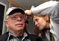 Eldon Cannon has his hearing checked at the Portland VA Medical Center. Researchers recently examined the impact of dual use—of VA and Medicare Advantage care—on older Veterans' health outcomes.   
