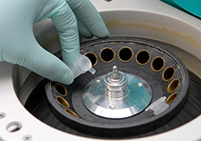  A blood sample is placed in a centrifuge as part of the process of separating out the DNA. VA is collaborating with NIH on efforts to boost the use of patients' genetic profiles and other individual factors to personalize medical care.