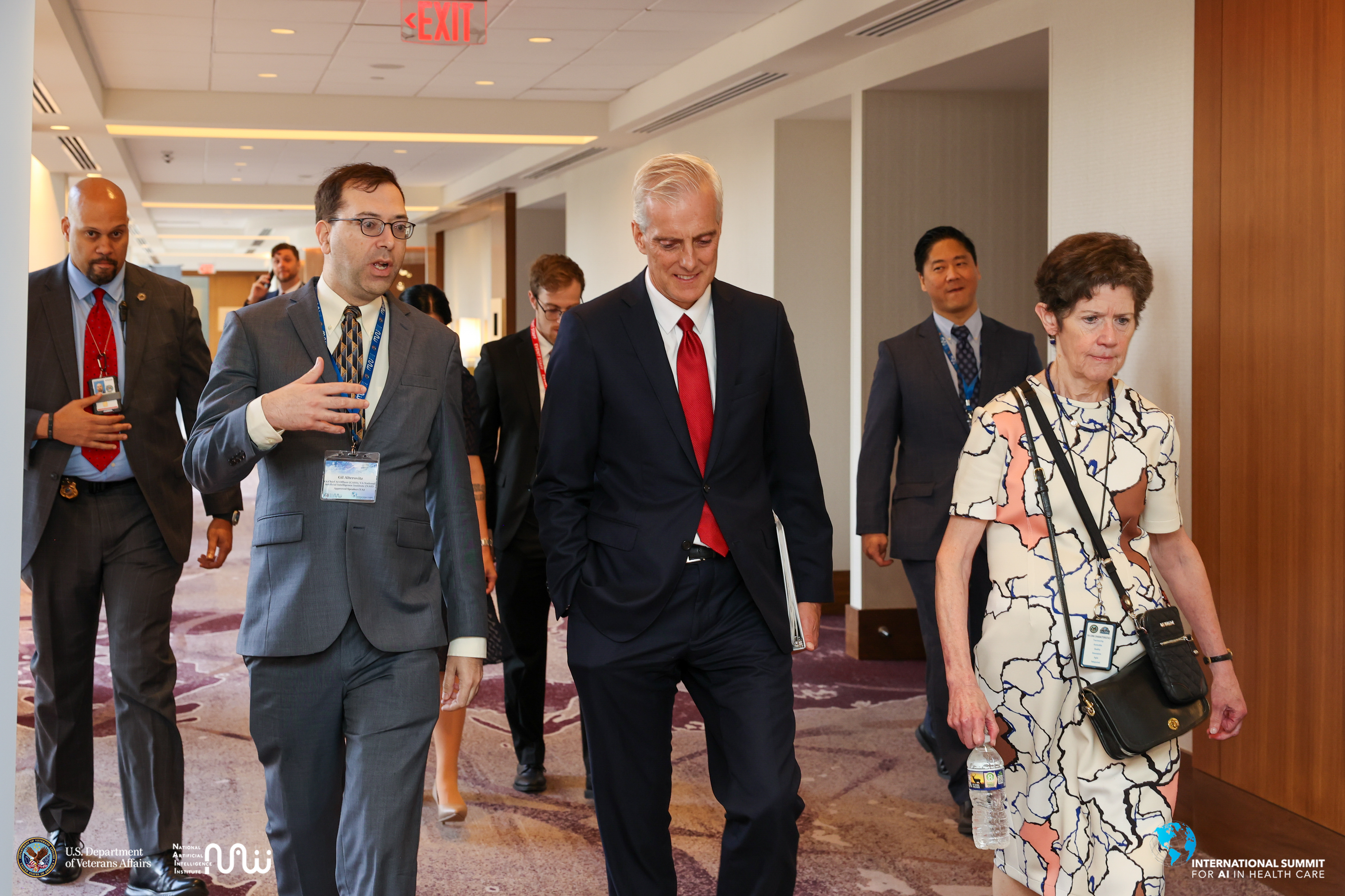 The Honorable Denis McDonough entering the AI Summit with Dr. Alterovitz and Dr. Clancy