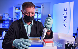 Joshua Williams at the Central Arkansas Veterans Healthcare System prepares a panel of pharmacogenetic DNA targets for genotyping on the MassARRAY System mass spectrometer.